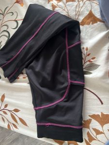 Black gym capri with Purple Stitching