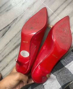 Chic Red Stiletto Heels with Bow Detail