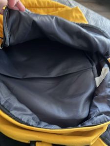 Yellow Backpack with "Escape plan" Text