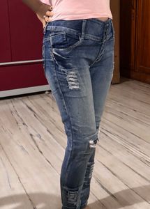Distressed Blue Denim Jeans