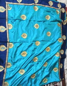 Beautiful Turquoise Saree with Gold Embroidery
