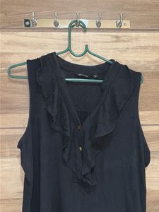 Elegant Ruffled Sleeveless Top