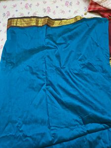 Elegant Teal Saree with Gold Border