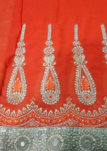 Stunning Orange Embroidered Saree