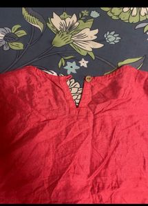 Elegant Red Kurta with Embellished Neckline