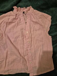 simple plain shirt with cute ruffle like style on