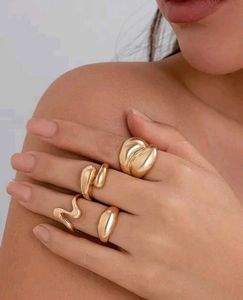 New and unused Chunky Gold Tone Ring Set