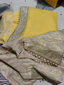 moti work yellow Saree with Embellished Border