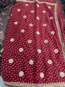 Elegant Maroon Saree with Gold Embroidery