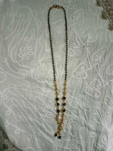Elegant golden colour Mangalsutra with Black Beads