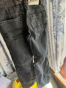 Distressed Black Jeans with Patches