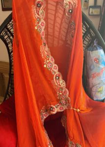 Flowing Orange Ethnic Skirt with choli and jacket