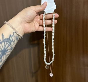 Pearl Necklace with Heart Pendant