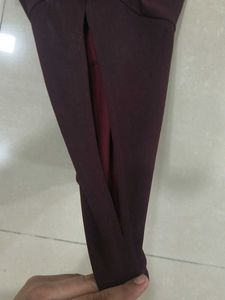 Women's Burgundy Bell Sleeve Dress with cut out.