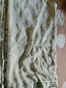 Elegant White Saree with Silver Motifs