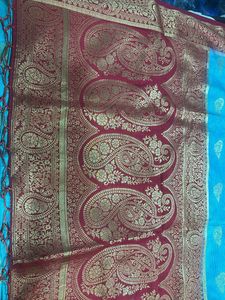 Vibrant Blue Silk Saree with Floral Border red col