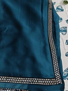 Elegant Teal Saree with Embellished Border