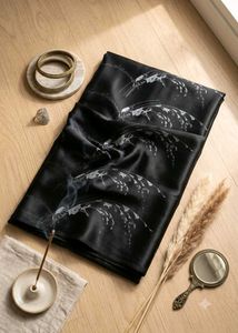 Elegant Black Sareewith Rice Grain Print