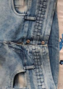 Light Wash Distressed Jeans with Unique Waistband