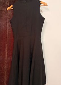 Classic Black Sleeveless Dress with Belt