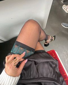 Sheer Thigh-High Stockings with Green Lace Trim