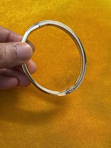 Elegant Gold Tone Bangle