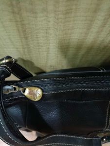 Chic Navy Leather Shoulder Bag with Flower Accent