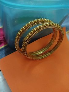 Elegant Gold Tone Beaded Bangles