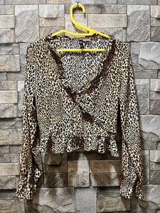Leopard Print Ruffle Long Sleeve Top