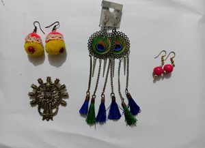 earrings set with a pendent