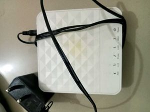 White Wi-Fi Router with Adapter