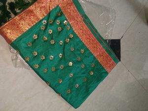Green Saree with Gold Embellishments