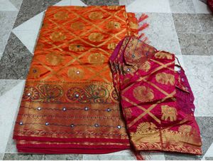 Vibrant Orange Silk Saree with Elephant Motifs