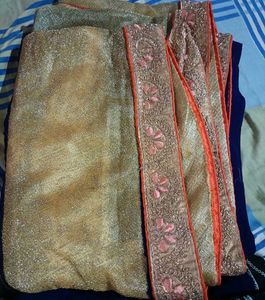 Sparkling Gold Saree with Pink Embroidery