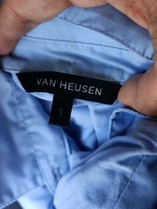 Light Blue Button-Up Shirt with Floral Detail