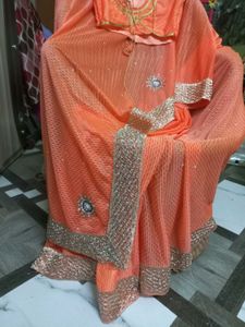 Elegant Peach Saree with Embellishments