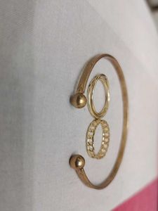 A Set Of Jwellery(1 Bracelet 2 Rings)