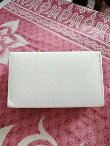 26.Chic White Clutch with Gold Chain