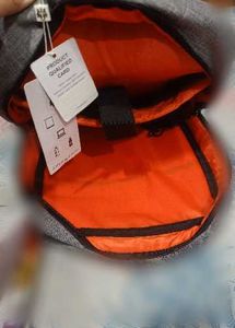 Stylish Grey Backpack with Tags