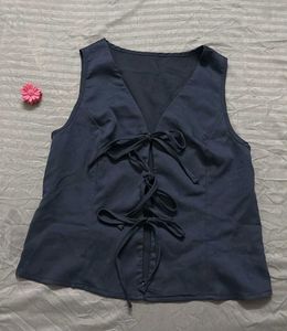 Sleeveless V-Neck Tie-Up Top from savana