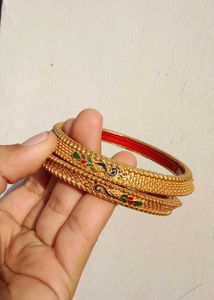 Exquisite Gold-Tone Bangles with Red Enamel Inlay