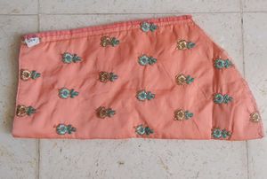 Ethnic peach gown with rich embroidery