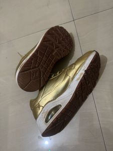 Gold Skechers Sneakers