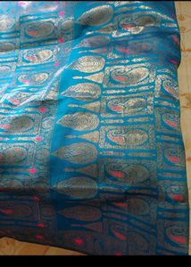 Elegant Teal Saree with Gold &amp; Pink Motifs