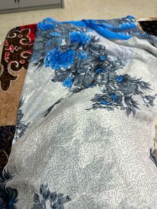 White saree with blue floral design beautifully ca