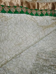 Grand Cream Saree with Green-Golden border