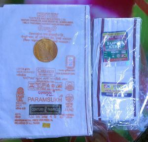 Century Fabrics white cotton dhoti , and towel