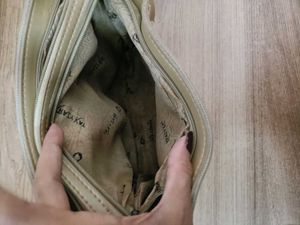 FOREVER YOUNG Beige Handbag with Pom Po