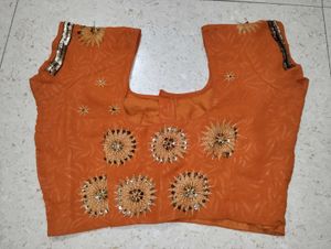 Orange Textured Blouse with Embellished Sleeves
