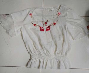 Embroidered Peplum Top with Ruffle Sleeves